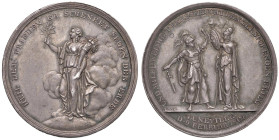 Medaglia 1801 Pace di Luneville. D/ HEIL DEM FRIEDEN ER SCHENKET SEGEN DER ERDE. La Pace in piedi, con cornucopia e ramoscello di ulivo, su parte del ...