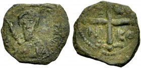 THE PRINCIPALITY OF ANTIOCH. TANCRED, 1104-1112. Copper coin type 2. Bearded bust of Tancred with chain armour and sword. Rv. Cross, in the angles IC ...
