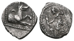 GREEK COINS LYCAONIA.Laranda.(Circa 324-323 BC).Obol. Obv : Baaltars seated left, holding grain ear, bunch of grapes, and scepter. Rev : Forepart of w...