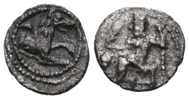 GREEK COINS LYCAONIA.Laranda.(Circa 324-323 BC).Obol. Obv : Baaltars seated left, holding grain ear, bunch of grapes, and scepter. Rev : Forepart of w...