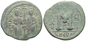 Byzantine  Justin II and Sophia, AE, Follis. (Bronze) Theoupolis (Antioch). 565-578 AD. Obv: Justin II and Sophia nimbate and seated on lyre-backed th...