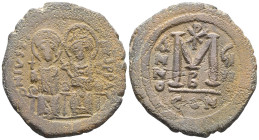 Byzantine Justin II and Sophia AD 565-578. Constantinople Follis Æ . D N VSTINVS P P AV, Justin left and Sophia right, seated facing on double-throne,...