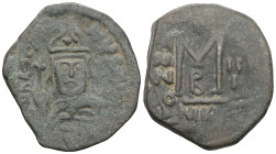 HERACLIUS ( 610-641). Follis. Nicomedia. Obv: Helmeted, draped and cuirassed bust facing, holding globus cruciger and shield. Rev: Large M between A/N...