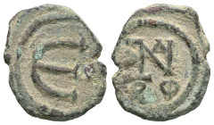 Byzantine Justin II (565-578) AE Pentanummium (Bronze) Nikomedia Obv: Monogram of Justin II Rev: Large E; N in right field. Ref: Sear 371.