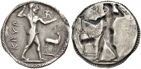 BRUTTIUM. KAULONIA. Nomos um 530 v. Chr. ΚΑΥΛ Apoll nackt n.r., in der erhobenen Rechten einen Lorbeerzweig haltend, auf seiner Linken rennt eine klei...