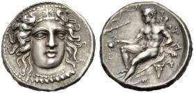 BRUTTIUM. KROTON. Nomos, ca. 400-325 v. Chr. Kopf der Hera Lakinia frontal, leicht n. r. geneigt; sie trägt einen mit einer Palmette und zwei Greifen ...