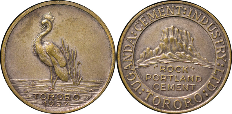 Africa. Uganda. Rock Portland Cement Æ Token. 1957. Stork standing in marsh with...