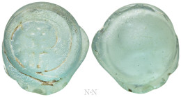 BYZANTINE GLASS WEIGHT. Pale green weight for Solidus ? (Circa 6th-7th centuries)