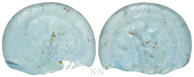 BYZANTINE GLASS WEIGHT. Pale green weight for Tremissis (Circa 6th-7th centuries)