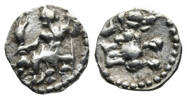 LYCAONIA. Laranda. (Circa 324/3 BC)
AR Obol (10,3mm 0,4g)
Obv: Baaltars seated left, holding grain ear and grape bunch in his right hand and scepter...