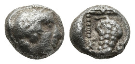 CILICIA. Soloi. (circa 425-375 BC)
AR Obol (7,3mm 0,7g)
Obv: Helmeted head of Athena right
Rev: Grape bunch within beaded linear border.
SNG Levan...