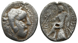 Uncertain (?)
AR Drachm (16,5mm 3,7g)
Obv: Head of Herakles right, wearing lion skin.
Rev: Apollo seated left on omphalos, holding arrow and bow; m...