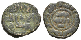 ISLAM. Califfato Umayyade. Fals anonimo per Haleb. AE (g 3,91). Leggenda araba su tre righe, con stella al centro. R/ Leggenda araba su tre righe e in...