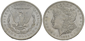 STATI UNITI. Dollaro Morgan 1885-O per New Orleans. AR. Testa della Libertà a sinistra. R/ Aquila di fronte con le ali spiegate, su frecce e ramo di u...