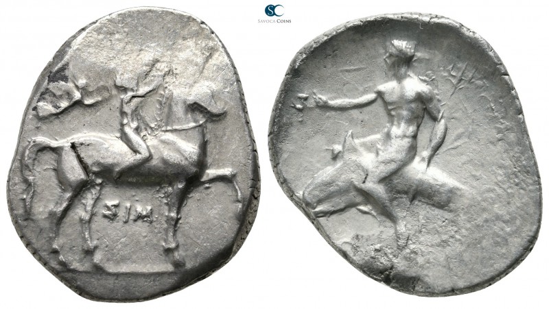 Calabria. Tarentum 330-300 BC. 
Nomos AR

25 mm., 7,87 g.

Horse stepping r...