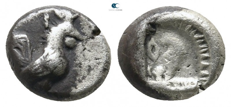 Macedon. Dikaia 450-425 BC. 
Diobol AR

9 mm., 1,21 g.

Cock standing right...