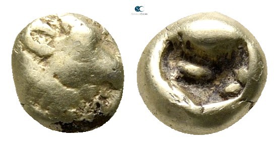 Ionia. Uncertain mint 600-550 BC. 
1/24 Stater EL

5 mm., 0,55 g.

Head of ...