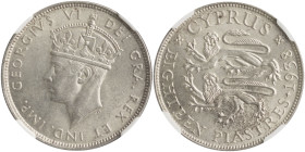 CYPRUS: 18 Piastres (1938) in silver (0,925). Crowned head of King George VI facing left on obverse. Two stylized rampant lions, date and denomination...