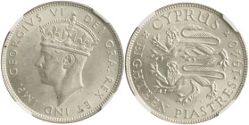 CYPRUS: 18 Piastres (1940) in silver (0,925). Crowned head of King George VI facing left on obverse. Two stylized rampant lions on reverse. Inside sla...