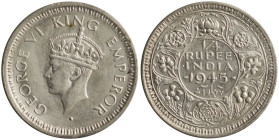 INDIA / BRITISH: 1/4 Rupee [1945 (b)] in silver (0,500). Small head of King George V facing left on obverse. Denomination and date within circle, wrea...