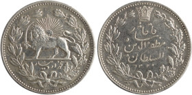 IRAN: 5000 Dinars (5 Kran) (AH1320) in silver (0,900). Legend within crowned wreath on obverse. Radiant lion holding sword within crowned wreath on re...