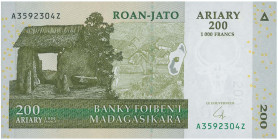 MADAGASCAR: 200 Ariary (2004) in green and tan on multicolor unpt. Village entrance on face. S/N: "A3592304Z". Signature by Frederic Rasamoely. (Pick ...