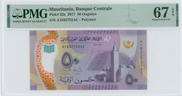 MAURITANIA: 50 Ouguiya (28.11.2017) in purple on multicolor. Ibn Abbas mosque at right on face. S/N: "A 1832752 AC". Inside holder by PMG "Superb Gem ...
