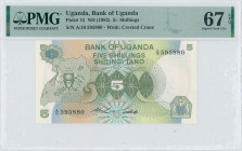 UGANDA: 5 Shillings (ND 1982) in olive-green on multicolor unpt. Coat of arms at left on face. S/N: "A/10 595880". WMK: Crested Crane. Inside holder b...