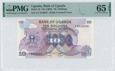 UGANDA: 10 Shillings (ND 1982) in purple on multicolor unpt. Coat of arms at left on face. S/N: "A/7 613056". WMK: Crested Crane. Inside holder by PMG...
