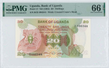 UGANDA: 20 Shillings (ND 1982) in green, dark red and multicolor. Coat of arms at left on face. S/N: "B/23 086344". WMK: Crested Crane. Inside holder ...