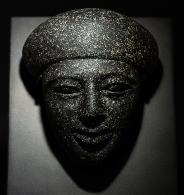 Egyptian sarcophagus mask, Ex Maurice Nahman

ITEM: Sarcophagus mask depicting...