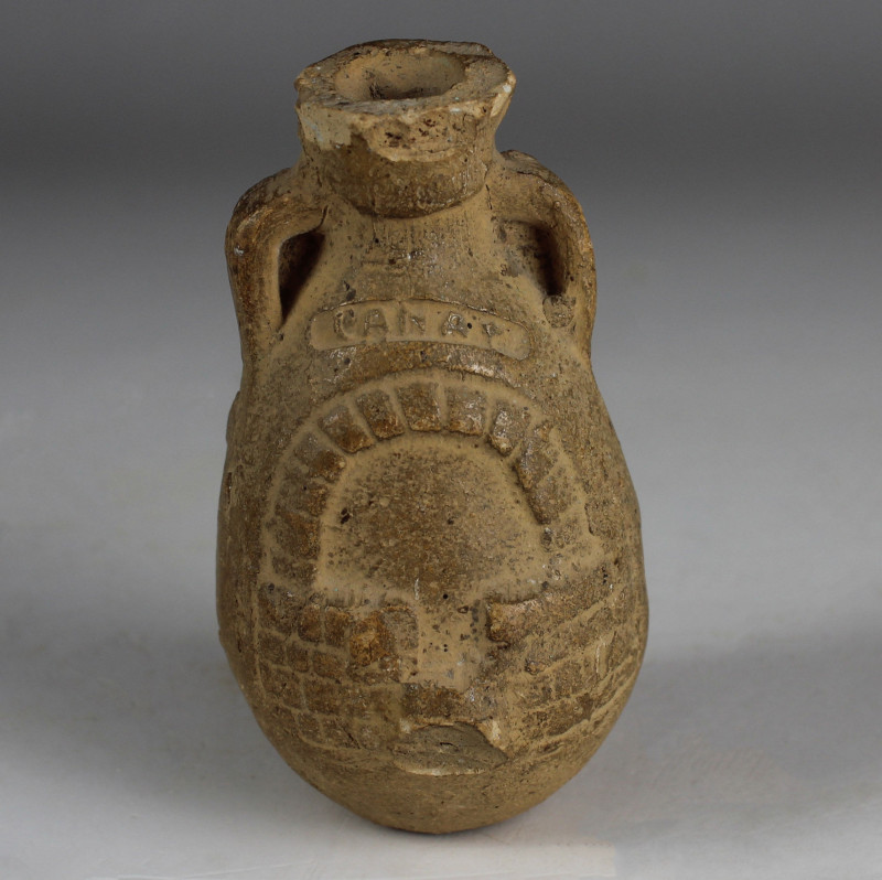Egyptian miniature amphora with baker's oven and inscription above 'PANAT'

IT...