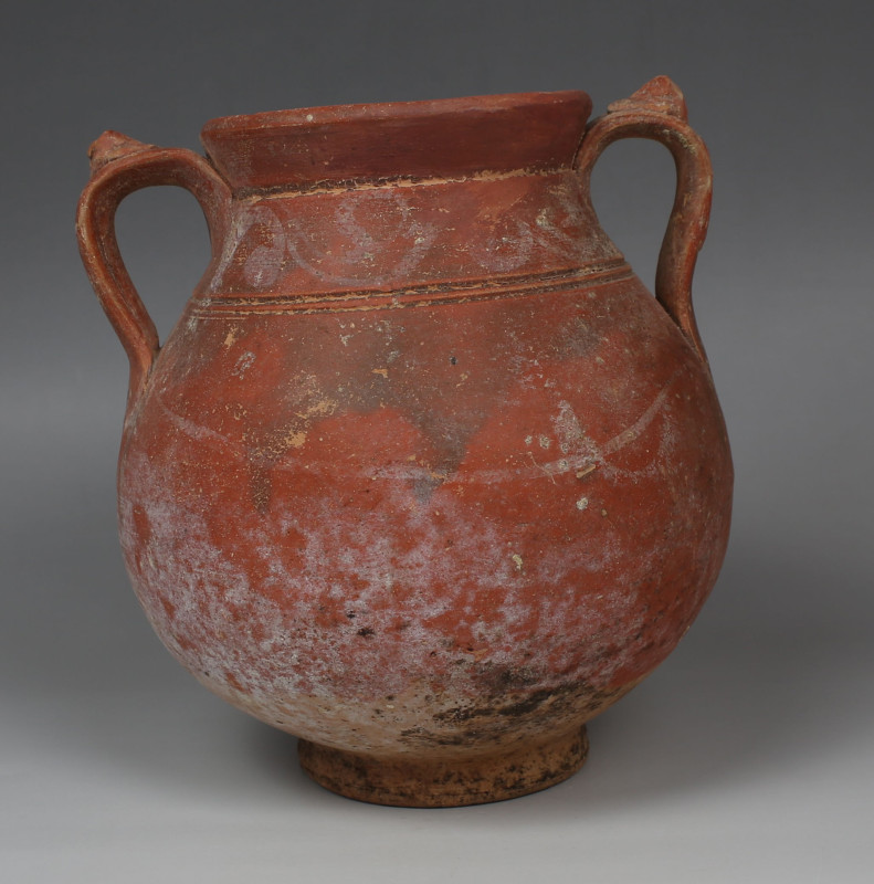 Greek double-handled jug with small applied heads on the handles

ITEM: Double...