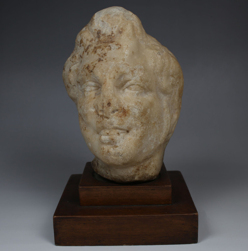 Roman head of a Satyr

ITEM: Head of a Satyr
 MATERIAL: Marble
 CULTURE: Rom...