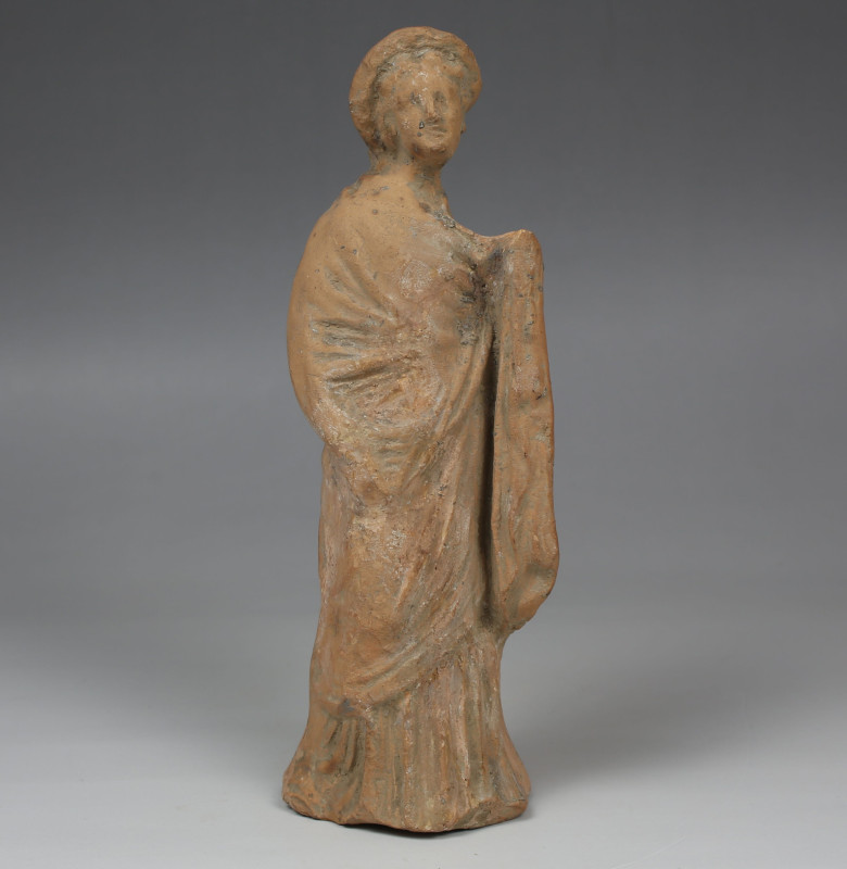 Greek Tanagra figurine

ITEM: Tanagra figurine
 MATERIAL: Pottery
 CULTURE: ...