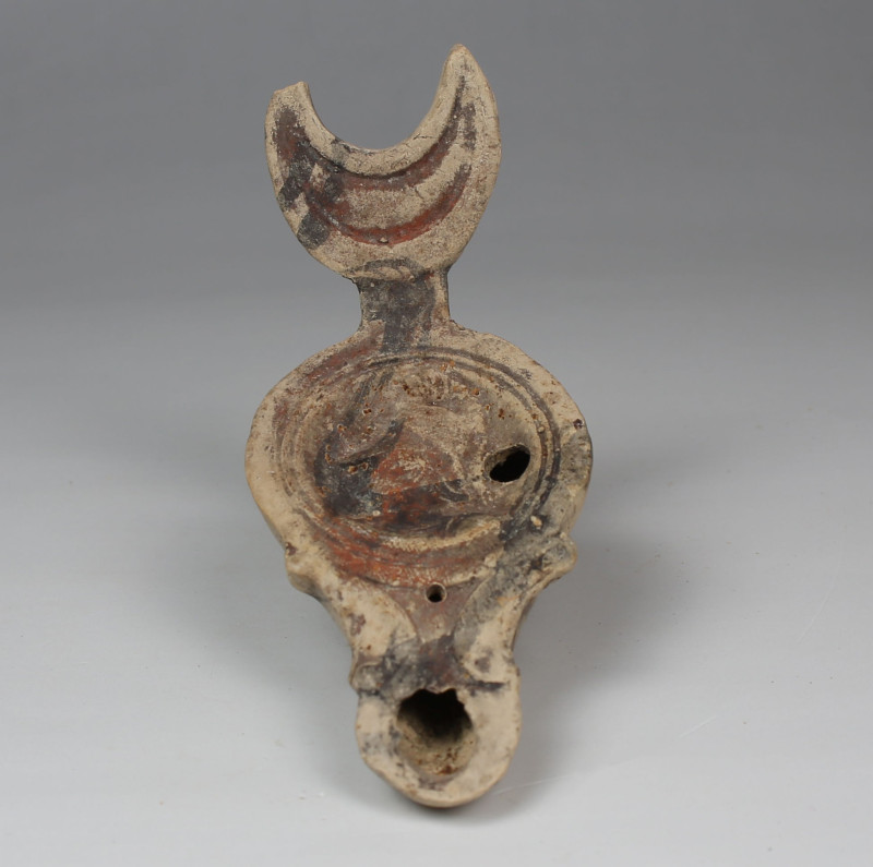 Roman oil lamp depicting Athena

ITEM: Oil lamp depicting Athena
 MATERIAL: P...