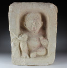 Romano-Egyptian funerary stele depicting a boy with a bird and a ball