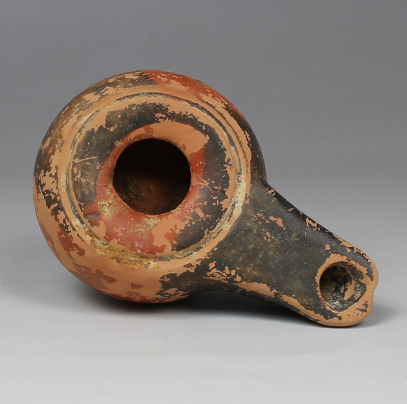 Greek oil lamp, Type Howland 25 A

ITEM: Oil lamp, Type Howland 25 A
 MATERIA...