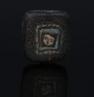 Romano-Egyptian face bead, probably Medusa