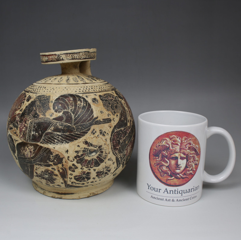 Greek, Corinthian aryballos depicting a winged deity and winged panther

ITEM:...