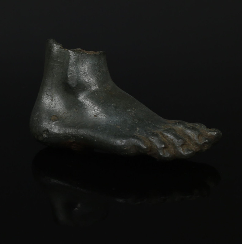 Roman foot fragment

ITEM: Foot fragment
 MATERIAL: Bronze
 CULTURE: Roman
...