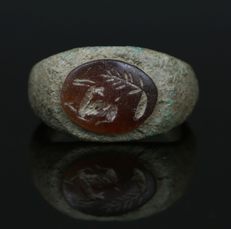 Roman ring depicting a deer and a tree

ITEM: Ring depicting a deer and a tree...