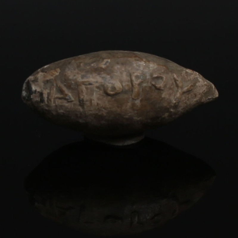 Greek sling bullet with inscription

ITEM: Sling bullet wiht inscription 'ΑΓΟΡ...