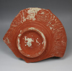 Roman bowl fragment with decoration and maker's mark