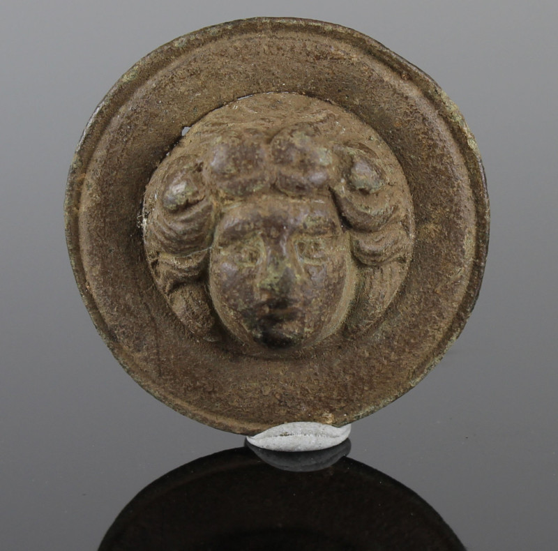 Roman roundel with a female head

ITEM: Roundel with a female head
 MATERIAL:...