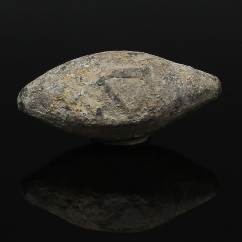 Greek sling bullet with symbol

ITEM: Sling bullet with symbol
 MATERIAL: Lea...