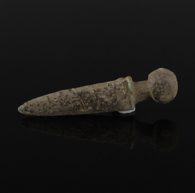 Roman gladius pendant

ITEM: Gladius pendant
 MATERIAL: Bronze
 CULTURE: Rom...