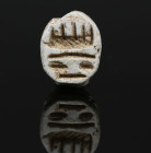 Egyptian scarab with defective inscription 'Amun-Re is Lord'