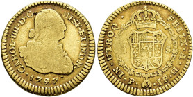 CARLOS IV. Escudo. 1797. Popayán. JF. AU 3,3 g. 19,42 mm. VI-964; AC-1155. Hoja en anv. BC+/MBC-.