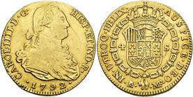 CARLOS IV. 4 escudos. 1792. Madrid. MF. AU 13,41 g. 28,8 mm. VI-1198; AC-1475. Estuvo engarzada. Rayas en anv. BC+/MBC-.